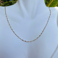 1.5mm 14K Yellow Gold Stamped Curved Mirror Link Chain